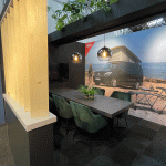 Beursstand ontworpen door Anggrek voor een recreatie en outdoor merk met warme uitstraling en open indeling tijdens Caravan Salon Düsseldorf